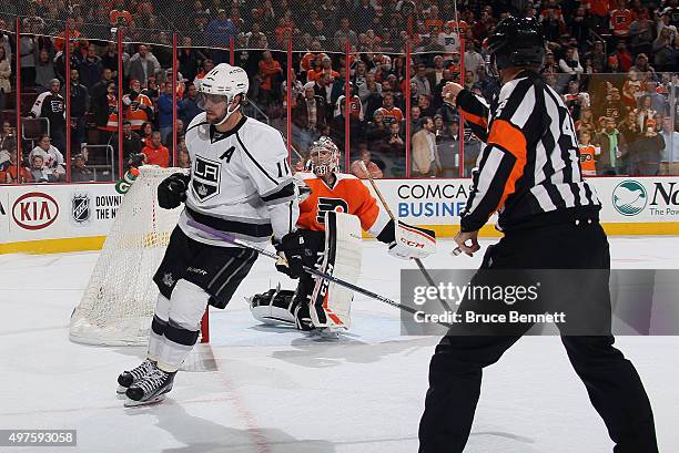 Anze Kopitar of the Los Angeles Kings scores the game winning goal in the shootout against Steve Mason of the Philadelphia Flyers at the Wells Fargo...