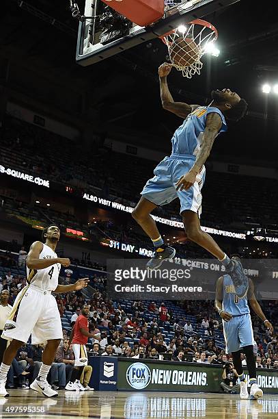 Will Barton of the Denver Nuggets dunks during the second half of a game against the New Orleans Pelicans at the Smoothie King Center on November 17,...