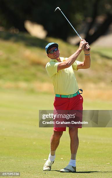 Retired AFL player and television personality Sam Newman plays a shot from the fairway during the Pro-Am ahead of the 2015 Australian Masters at...