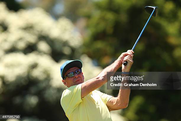 Retired AFL player and television personality Sam Newman hits a tee shot during the Pro-Am ahead of the 2015 Australian Masters at Huntingdale Golf...