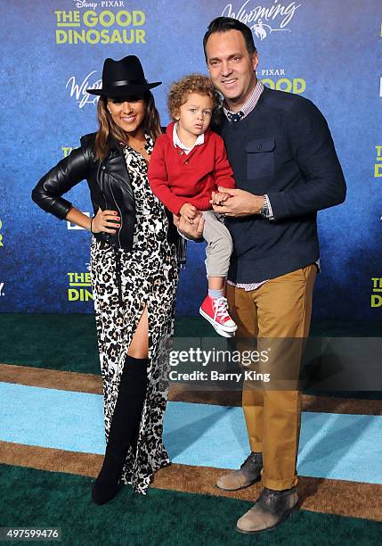 Actress Tamera Mowry, son Aden John Tanner Housley and husband Adam Housley attend the premiere of Disney-Pixar's 'The Good Dinosaur' at the El...