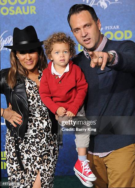 Actress Tamera Mowry, son Aden John Tanner Housley and husband Adam Housley attend the premiere of Disney-Pixar's 'The Good Dinosaur' at the El...