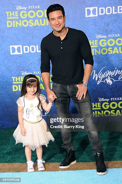 Personality Mario Lopez and daughter Gia Francesca Lopez attend the Premiere of Disney-Pixar's 'The Good Dinosaur' at the El Capitan Theatre on...