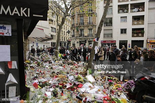 Floral tributes have been placed at the memorial outside the restaurant La Belle Équipe for the people killed here during the Paris attacks....