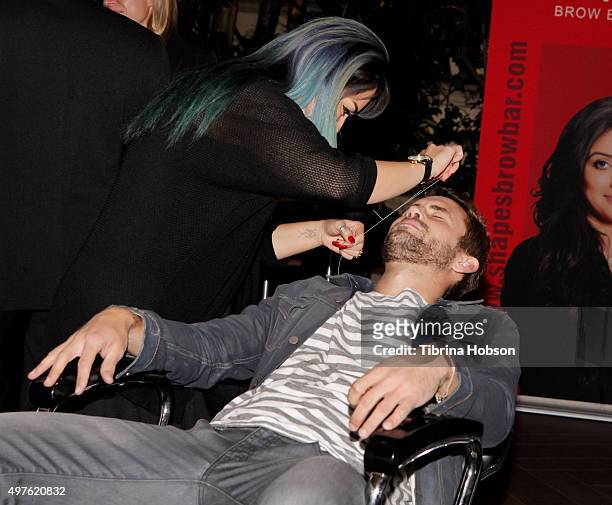 Nick Viall gets his eyebrows threaded at Ryan Seacrest Purse Party at Four Seasons Hotel Los Angeles at Beverly Hills on November 17, 2015 in Los...