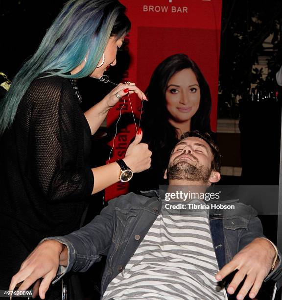 Nick Viall gets his eyebrows threaded at Ryan Seacrest Purse Party at Four Seasons Hotel Los Angeles at Beverly Hills on November 17, 2015 in Los...