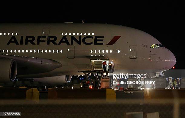 Air France Airbus 380, Flight 65, sits on the runway at the Salt Lake City International Airport being inspected by the FBI on November 17, 2015 in...
