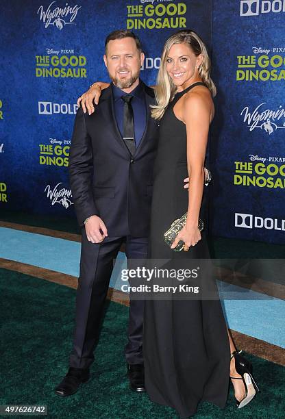 Actor AJ Buckley and Abigail Ochse attend the Premiere of Disney-Pixar's 'The Good Dinosaur' at the El Capitan Theatre on November 17, 2015 in...