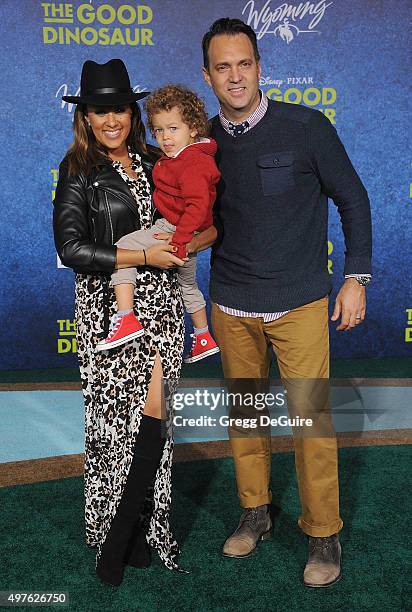 Actress Tamera Mowry-Housley, son Aden John Tanner Housley and husband Adam Housley arrive at the premiere of Disney-Pixar's "The Good Dinosaur" on...