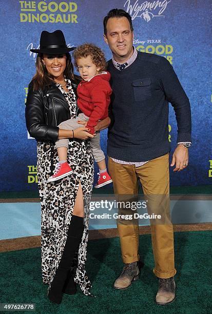 Actress Tamera Mowry-Housley, son Aden John Tanner Housley and husband Adam Housley arrive at the premiere of Disney-Pixar's "The Good Dinosaur" on...