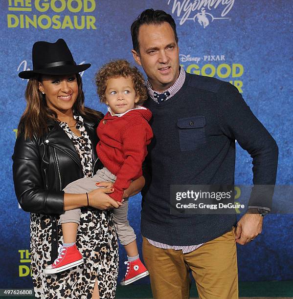 Actress Tamera Mowry-Housley, son Aden John Tanner Housley and husband Adam Housley arrive at the premiere of Disney-Pixar's "The Good Dinosaur" on...