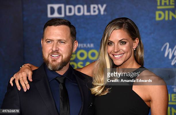 Actor AJ Buckley and Abigail Ochse arrive at the premiere of Disney-Pixar's "The Good Dinosaur" on November 17, 2015 in Hollywood, California.