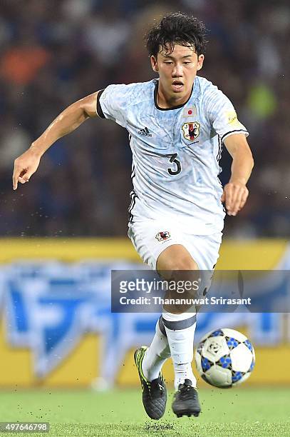 Wataru Endo of Japan runs with the ball during the 2018 FIFA World Cup Qualifier match between Cambodia and Japan on November 17, 2015 in Phnom Penh,...