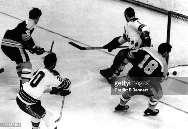 Bobby Orr of the Boston Bruins scores on goalie Ed Giacomin of the New York Rangers during Game 5 of the 1970 Quarter Finals on April 14, 1970 at the...