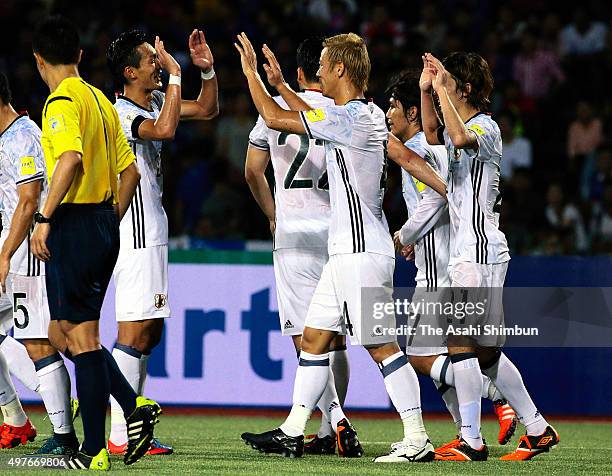 Keisuke Honda of Japan celebrates scoring his team's second goal with his team mates during the 2018 FIFA World Cup Qualifier match between Cambodia...