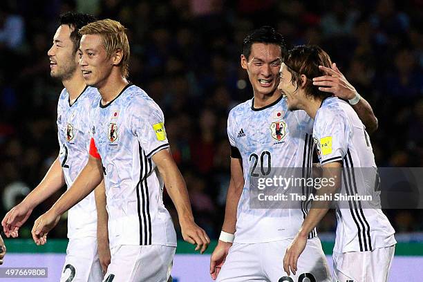 Keisuke Honda of Japan celebrates scoring his team's second goal with his team mates during the 2018 FIFA World Cup Qualifier match between Cambodia...