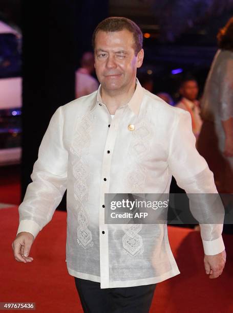 Russian Prime Minister Dmitry Medvedev arrives for a welcome dinner during the Asia-Pacific Economic Cooperation summit in the capital city of Manila...