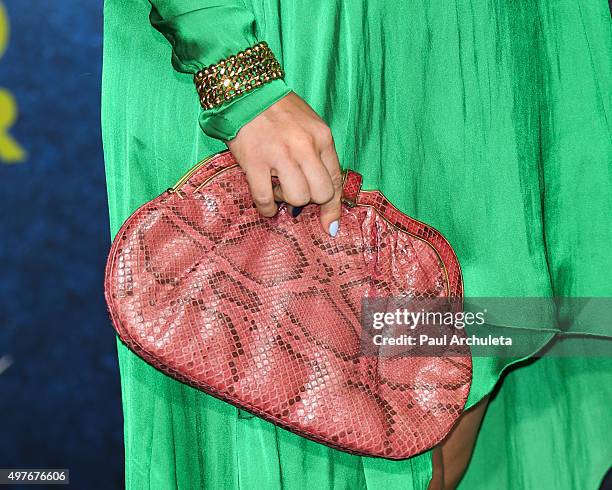 Actress Alyshia Ochse ,Handgabg Detail; attends the premiere of Disney-Pixar's "The Good Dinosaur" on November 17, 2015 in Hollywood, California.