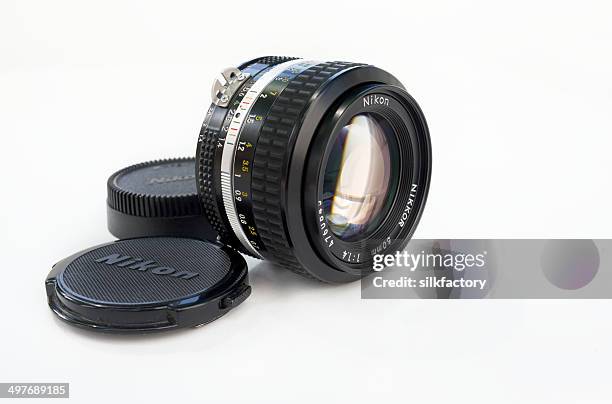 vintage nikon 50mm 1.4 lens for photography camera - nikon stock pictures, royalty-free photos & images