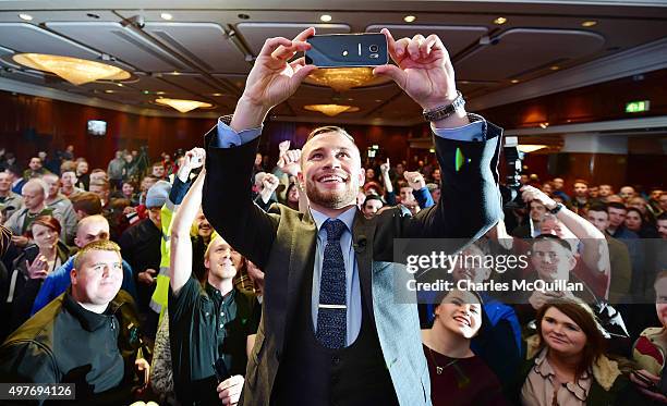 World champion Carl Frampton takes a selfie on a smart phone after the WBA and IBF super-bantamweight world title unification pre-fight press...