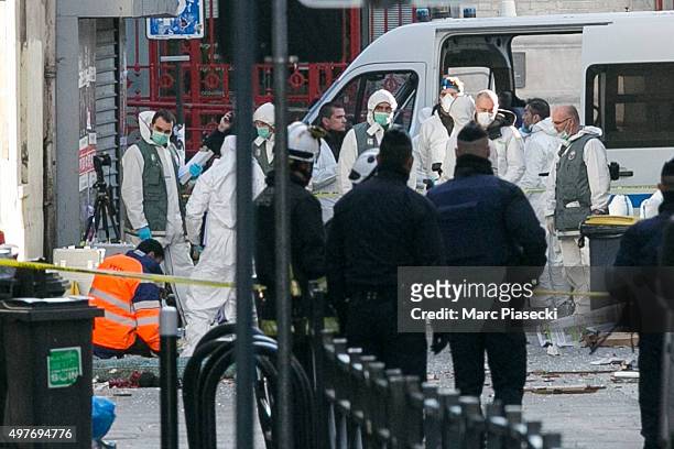 French Police Forensics officers work on Rue des Corbillon in the northern Paris suburb of Saint-Denis following a raid on an apartment on November...