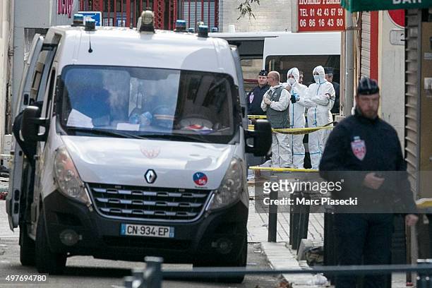 French Police Forensics officers work on Rue des Corbillon in the northern Paris suburb of Saint-Denis following a raid on an apartment on November...