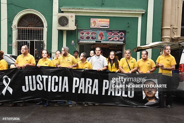 Paraguayan journalists protest against former Ypejhu mayor Vilmar Neneco Acosta in front of the prosecutor's office in Asuncion, on November 18, 2015...