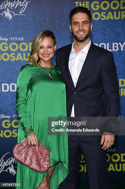 Actress Alyshia Ochse and Lee Knaz arrive at the premiere of Disney-Pixar's "The Good Dinosaur" on November 17, 2015 in Hollywood, California.