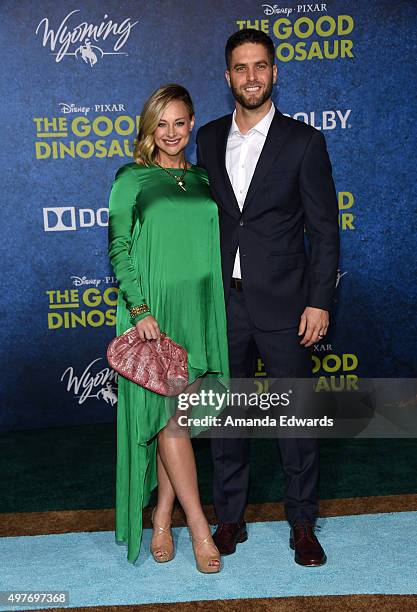 Actress Alyshia Ochse and Lee Knaz arrive at the premiere of Disney-Pixar's "The Good Dinosaur" on November 17, 2015 in Hollywood, California.