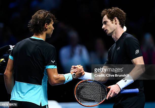 Rafael Nadal of Spain shakes hands with Andy Murray of Great Britain after his victory in their men's singles match during day four of the Barclays...
