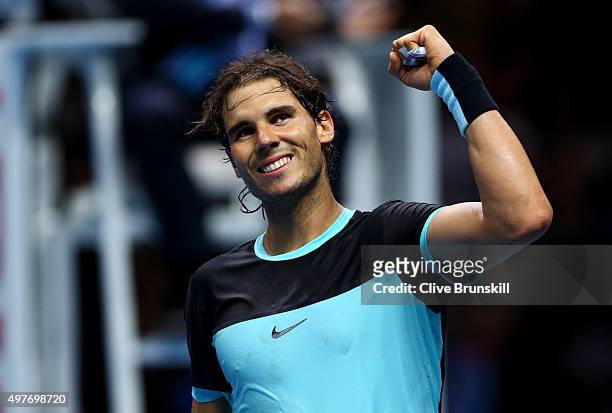 Rafael Nadal of Spain celebrates victory in his men's singles match against Andy Murray of Great Britain during day four of the Barclays ATP World...