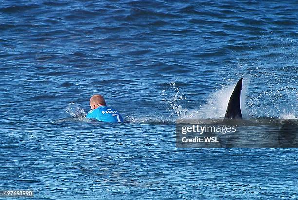 In this screen grab from footage by the World Surf League, Mick Fanning of Australia is attacked by a Shark at the Jbay Open on July 19, 2015 in...