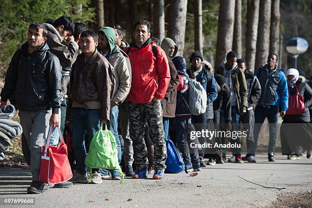 Refugees cross the border between Austria and Germany, on November 18, 2015 near Wegscheid, Germany.