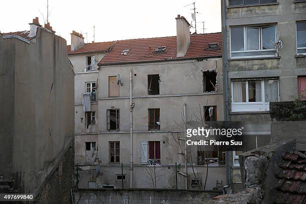 The damaged building that was raided earlier in the morning is pictured on November 18, 2015 in Saint-Denis, France. French Police special forces...