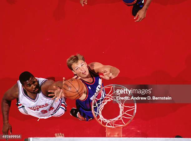 Danny Ainge of the Phoenix Suns shoots against the Los Angeles Clippers circa 1993 at the LA Sports Arena in Los Angeles, California. NOTE TO USER:...
