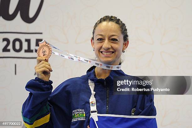 Alice Aleluia Da Luz of Brazil celebrates with her bronze medal on the podium during the Women's 52kg Sanda Competition medals ceremony of the 2015...