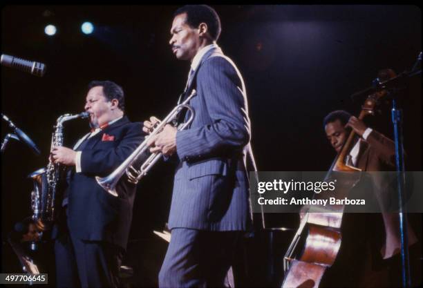 From left, American jazz musicians Jackie McLean , on saxophone, Woody Shaw , on trumpet, and Cecil McBee, on bass, perform on stage during the 'One...