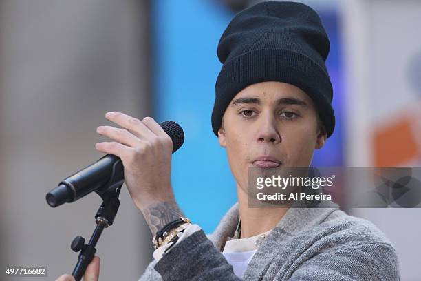 Justin Bieber sticks his tongue out when he performs on NBC's "Today" Show at the Rockefeller Plaza on November 18, 2015 in New York, New York.