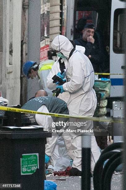 Forensics of the french police are seen in front of the '8, Rue du Corbillon' on November 18, 2015 in Saint-Denis, France. French Police special...