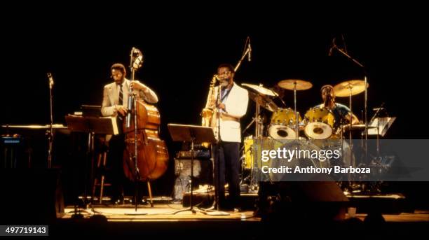 From left, American jazz musicians Ron Carter, on bass, Freddie Hubbard , on saxophone, and Tony Williams , on drummer, perform on stage during the...