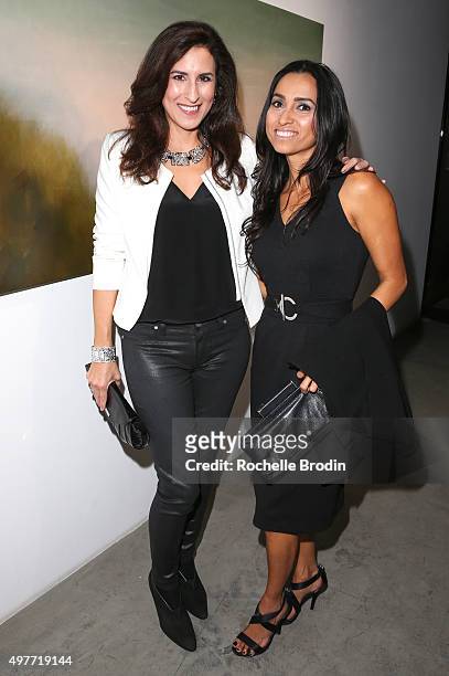 Rita Panagis and Juliete Sabillon attend Steven Janssen's "Brain Change" art exhibition at De Re Gallery on November 17, 2015 in West Hollywood,...