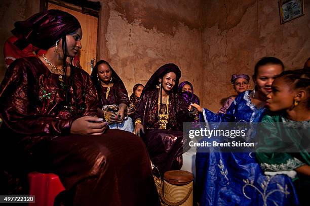 Tuareg women attend the wedding of Tuareg girl, Mariam Francois Acosta a girl descended from mixed Tuareg French blood, on September 25, 2009 in...