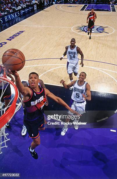 Kevin Johnson of the Phoenix Suns shoots against the Sacramento Kings circa 1996 at Arco Arena in Sacramento, California. NOTE TO USER: User...