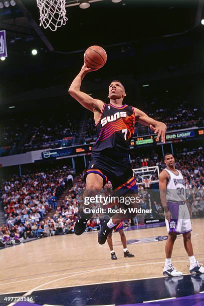 Kevin Johnson of the Phoenix Suns shoots against the Sacramento Kings circa 1996 at Arco Arena in Sacramento, California. NOTE TO USER: User...