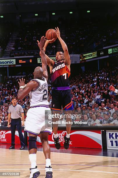 Kevin Johnson of the Phoenix Suns shoots against the Sacramento Kings circa 1996 at Arco Arena in Sacramento, California. NOTE TO USER: User...