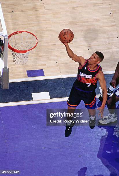 Kevin Johnson of the Phoenix Suns shoots against the Sacramento Kings circa 1996 at Arco Arena in Sacramento, California. NOTE TO USER: User...