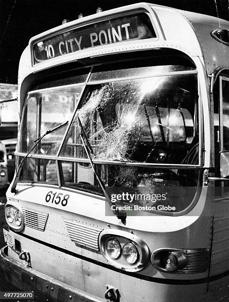 The front windshield of a bus driven by Ralph C. Kelley, who is black, is cracked after rocks were thrown at it at P and 4th Streets in South Boston...