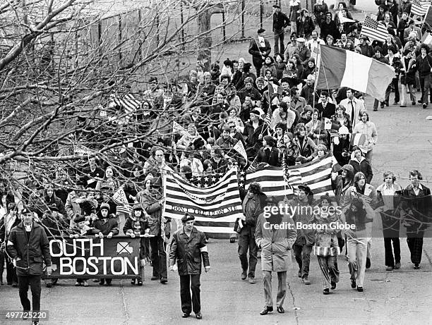 Protesters from South Boston arrive at East Boston Stadium for an anti-busing rally on Nov. 24, 1974. An initiative to desegregate Boston Public...