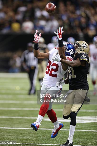 Reuben Randle of the New York Giants is defended by Keenan Lewis during the game against the New Orleans Saints at the Mercedes-Benz Superdome on...