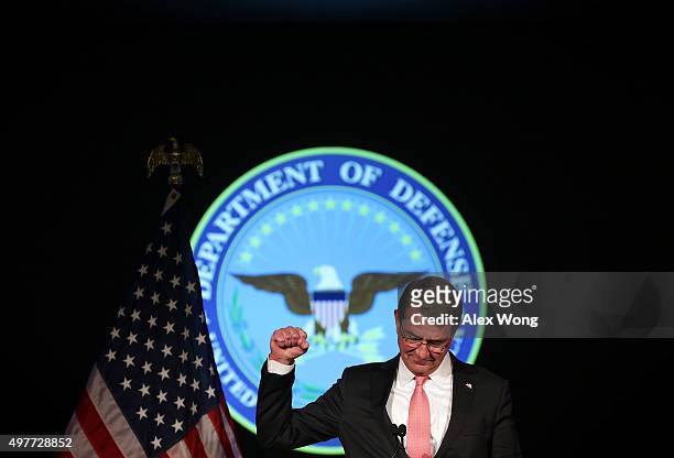Secretary of Defense Ashton Carter gestures as he addresses the faculty and students of George Washington University November 18, 2015 in Washington,...